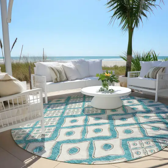 8' Teal Blue And Ivory Round Geometric Washable Indoor Outdoor Area Rug Photo 7