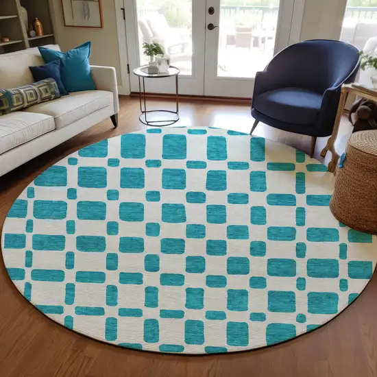 8' Teal Blue And Ivory Round Geometric Washable Indoor Outdoor Area Rug Photo 7