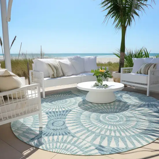 8' Teal Blue And Ivory Round Geometric Washable Indoor Outdoor Area Rug Photo 7