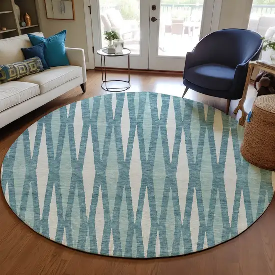 8' Teal Blue And Ivory Round Geometric Washable Indoor Outdoor Area Rug Photo 7