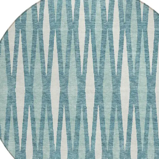 8' Teal Blue And Ivory Round Geometric Washable Indoor Outdoor Area Rug Photo 4
