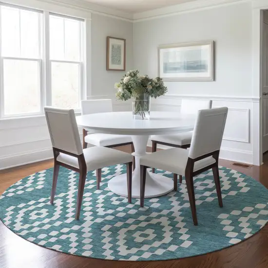 8' Teal Blue And Ivory Round Geometric Washable Indoor Outdoor Area Rug Photo 7