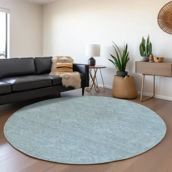 8' Teal Blue And Ivory Round Geometric Washable Indoor Outdoor Area Rug Photo 7