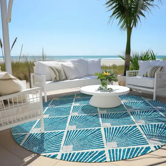 8' Teal Blue And Ivory Round Geometric Washable Indoor Outdoor Area Rug Photo 7