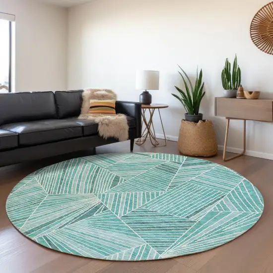 8' Teal Blue And Ivory Round Geometric Washable Indoor Outdoor Area Rug Photo 7