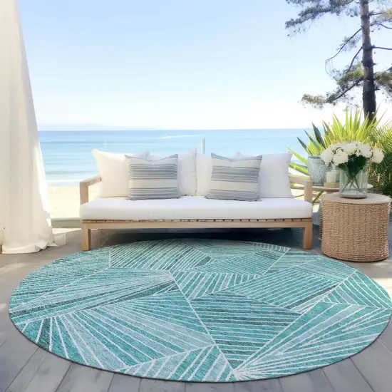 8' Teal Blue And Ivory Round Geometric Washable Indoor Outdoor Area Rug Photo 6