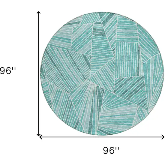 8' Teal Blue And Ivory Round Geometric Washable Indoor Outdoor Area Rug Photo 3