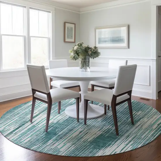 8' Teal Blue And Ivory Round Striped Washable Indoor Outdoor Area Rug Photo 7
