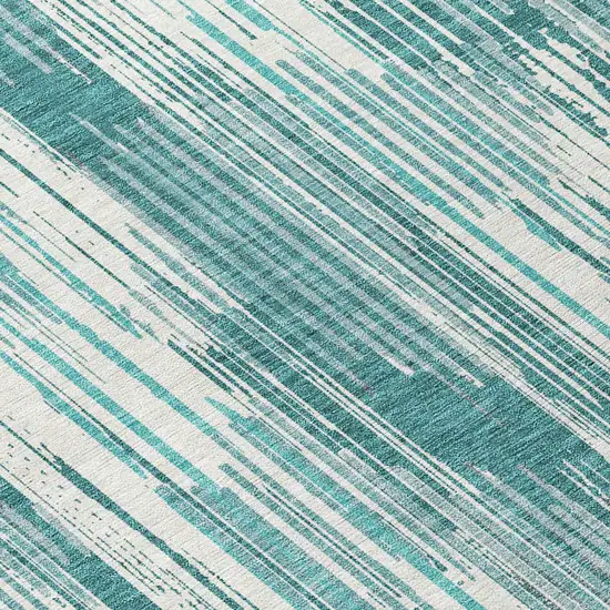 8' Teal Blue And Ivory Round Striped Washable Indoor Outdoor Area Rug Photo 8