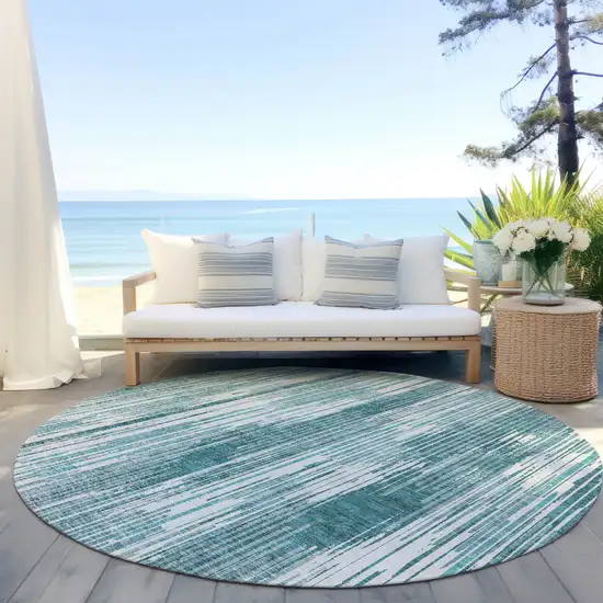 8' Teal Blue And Ivory Round Striped Washable Indoor Outdoor Area Rug Photo 6