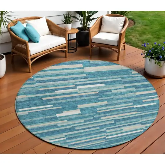 8' Teal Blue And Ivory Round Striped Washable Indoor Outdoor Area Rug Photo 1