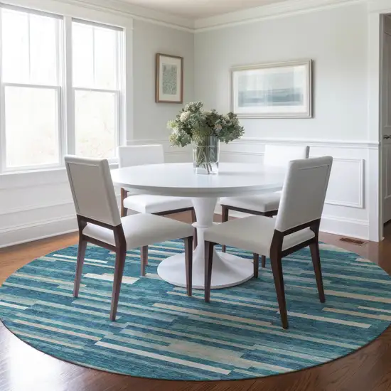 8' Teal Blue And Ivory Round Striped Washable Indoor Outdoor Area Rug Photo 7