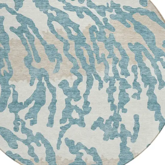 8' Teal Blue Beige And Ivory Round Animal Print Washable Indoor Outdoor Area Rug Photo 4