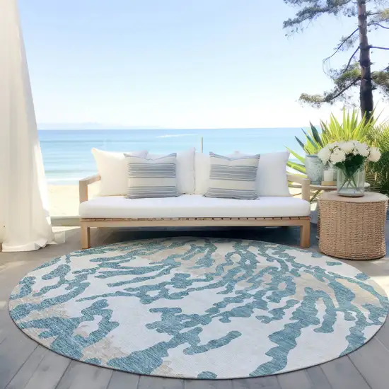 8' Teal Blue Beige And Ivory Round Animal Print Washable Indoor Outdoor Area Rug Photo 6