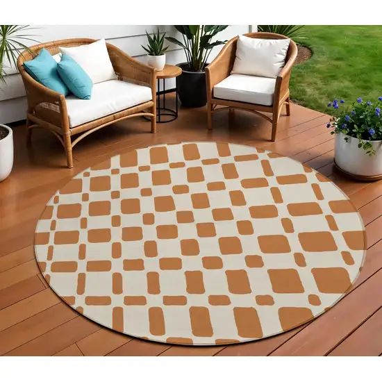 8' Terra Cotta And Beige Round Geometric Washable Indoor Outdoor Area Rug Photo 1