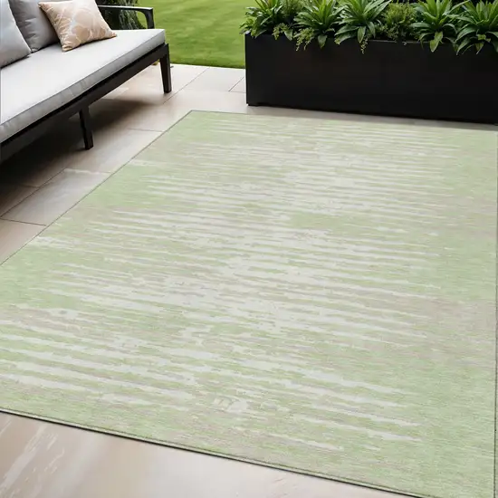 Artichoke Green And Ivory Striped Washable Indoor Outdoor Area Rug Photo 1