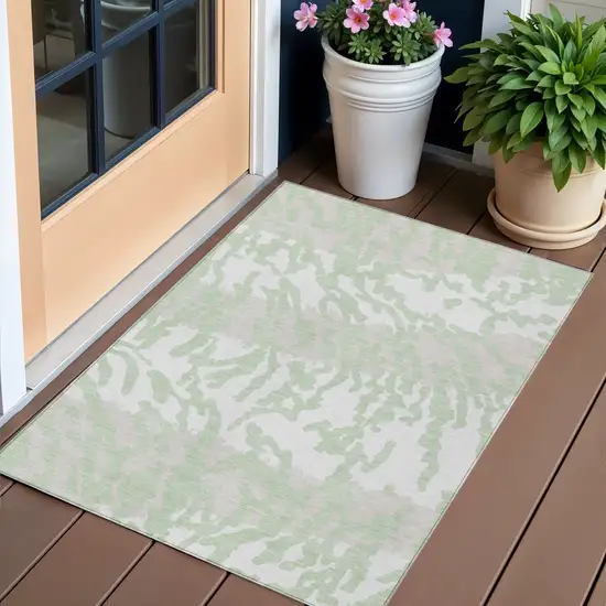Artichoke Green Beige And Ivory Animal Print Washable Indoor Outdoor Area Rug Photo 1