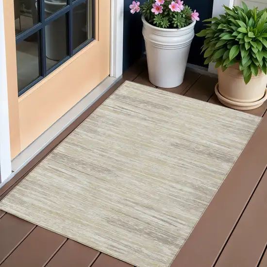 Beige Brown And Ivory Striped Washable Indoor Outdoor Area Rug Photo 1