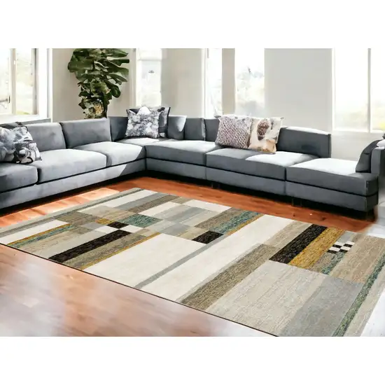 Beige Gold Black Grey Tan Teal And Rust Geometric Power Loom Area Rug Photo 2