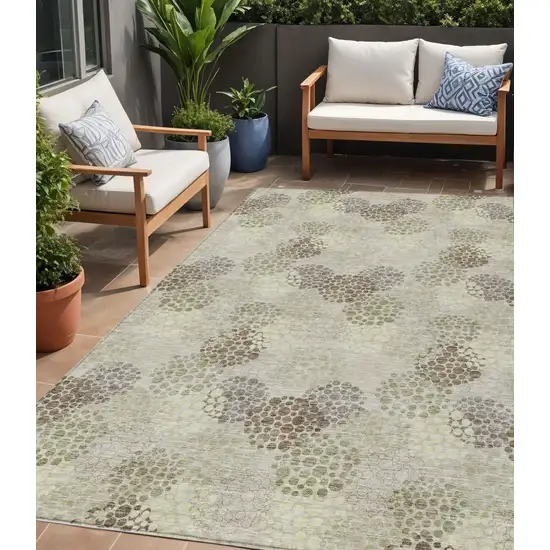 Beige Green And Ivory Polka Dot Washable Indoor Outdoor Area Rug Photo 1