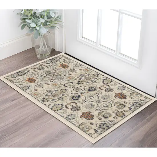 Beige And Blue Floral Area Rug Photo 1