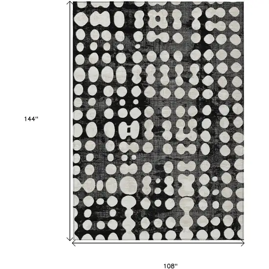 Black And Ivory Abstract Washable Indoor Outdoor Area Rug Photo 3