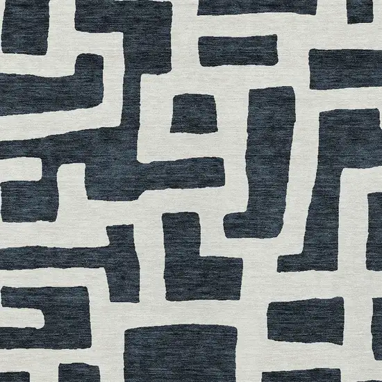Black And Ivory Abstract Washable Indoor Outdoor Area Rug Photo 6