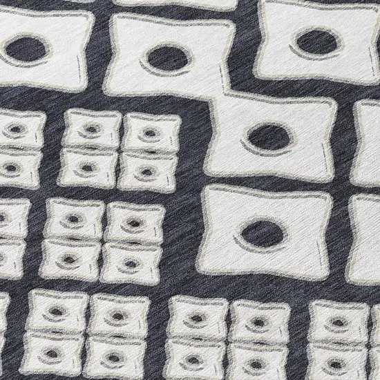 Black And Ivory Geometric Washable Indoor Outdoor Area Rug Photo 6