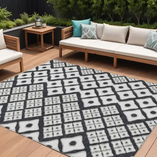 Black And Ivory Geometric Washable Indoor Outdoor Area Rug Photo 1