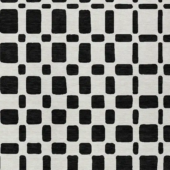 Black And Ivory Geometric Washable Indoor Outdoor Area Rug Photo 6