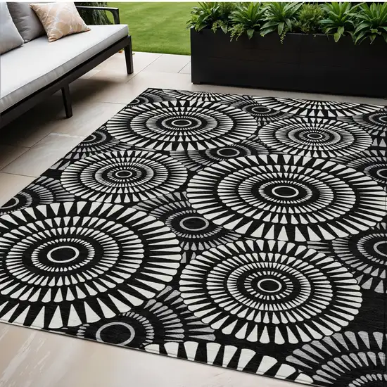 Black And Ivory Geometric Washable Indoor Outdoor Area Rug Photo 1