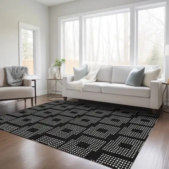 Black And Ivory Geometric Washable Indoor Outdoor Area Rug Photo 9