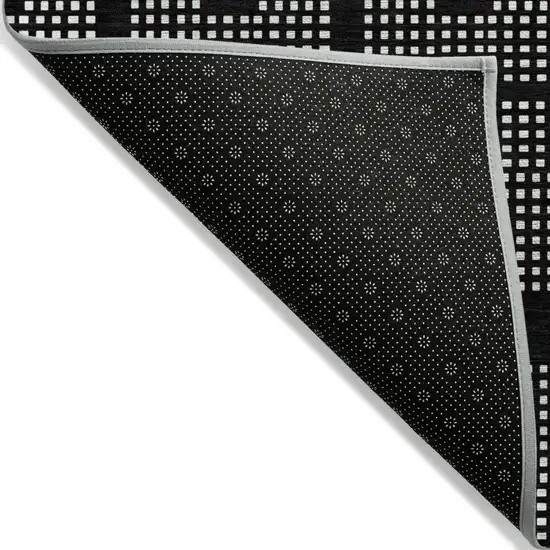 Black And Ivory Geometric Washable Indoor Outdoor Area Rug Photo 4