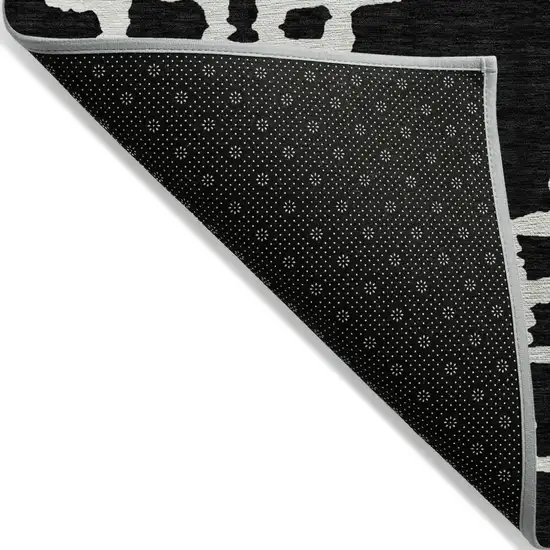 Black And Ivory Geometric Washable Indoor Outdoor Area Rug Photo 5