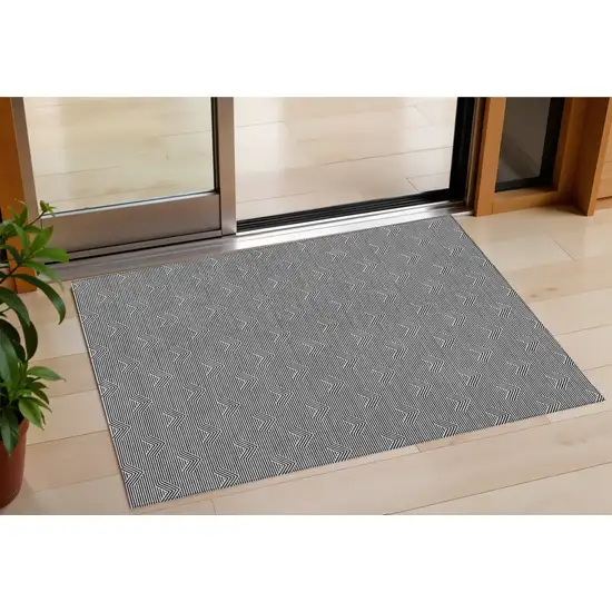 Black And Ivory Geometric Washable Indoor Outdoor Area Rug Photo 1