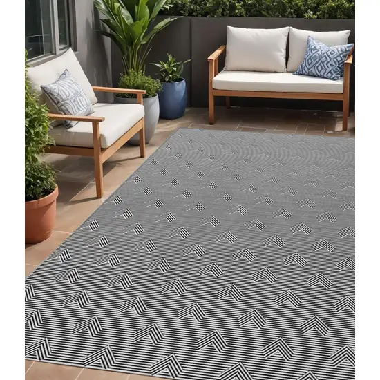 Black And Ivory Geometric Washable Indoor Outdoor Area Rug Photo 1