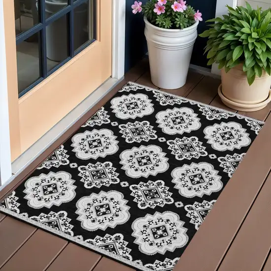 Black And Ivory Medallion Washable Indoor Outdoor Area Rug Photo 1