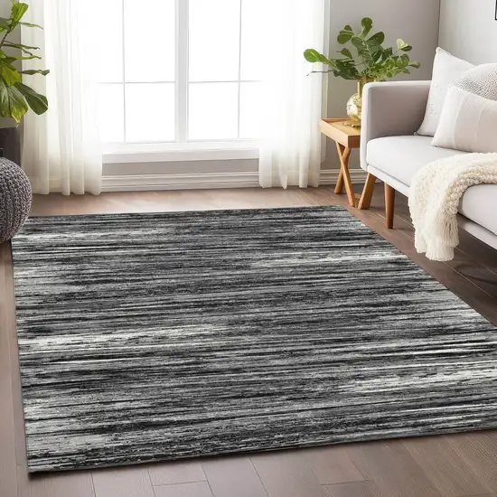 Black And Ivory Striped Washable Indoor Outdoor Area Rug Photo 9