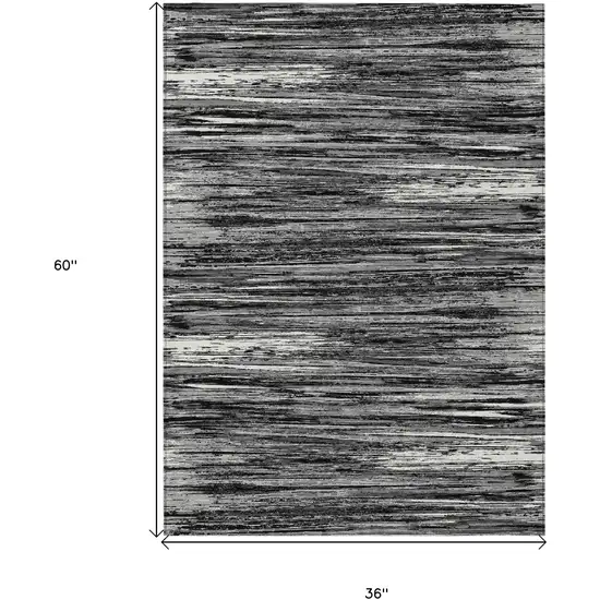 Black And Ivory Striped Washable Indoor Outdoor Area Rug Photo 3