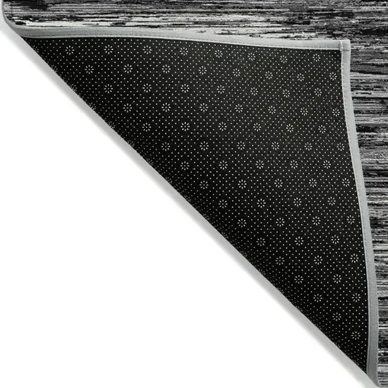 Black And Ivory Striped Washable Indoor Outdoor Area Rug Photo 4