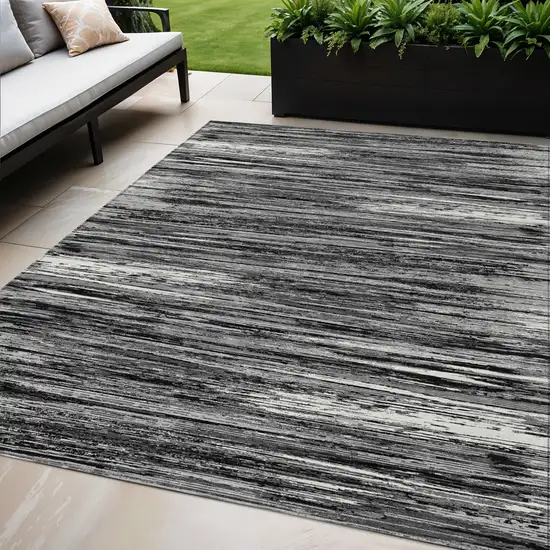 Black And Ivory Striped Washable Indoor Outdoor Area Rug Photo 1