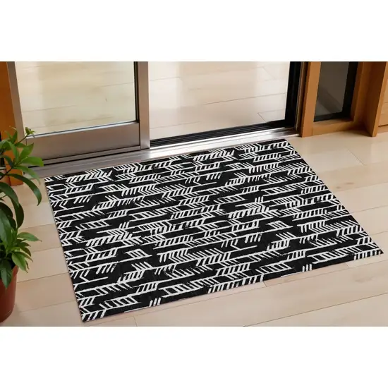 Black And Ivory Tribal Washable Indoor Outdoor Area Rug Photo 1
