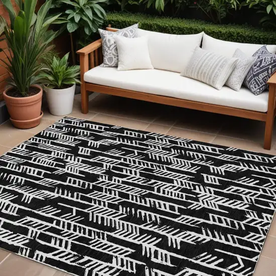 Black And Ivory Tribal Washable Indoor Outdoor Area Rug Photo 1
