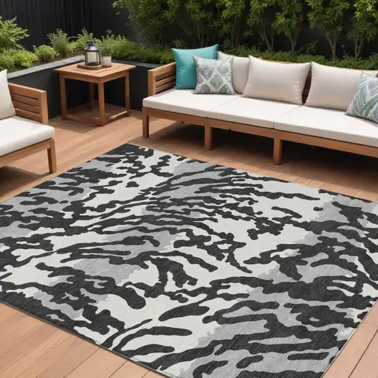 Black Gray And Ivory Animal Print Washable Indoor Outdoor Area Rug Photo 1
