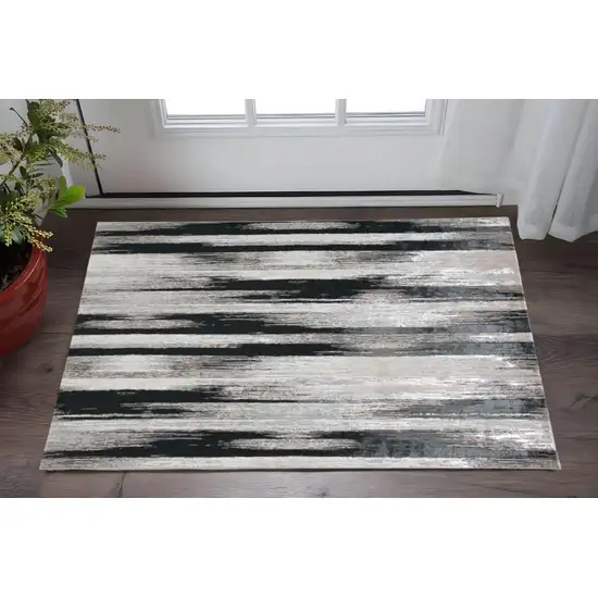 Black Silver and Gray Abstract Power Loom Area Rug Photo 1