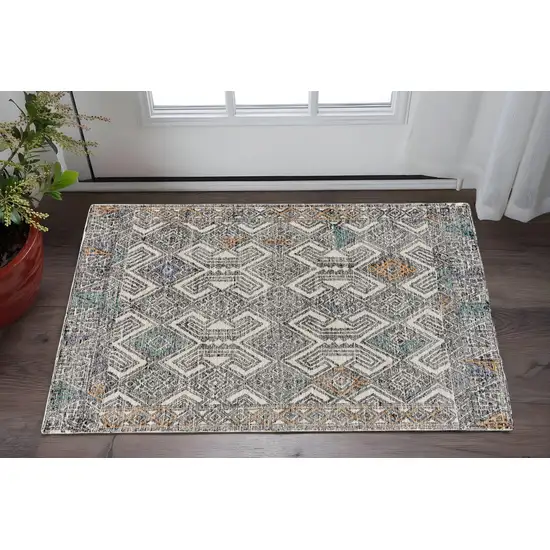 Black and Ivory Wool Chevron Hand Tufted Distressed Area Rug Photo 1