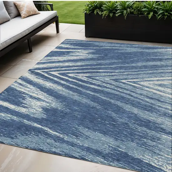 Blue And Ivory Abstract Washable Indoor Outdoor Area Rug Photo 1