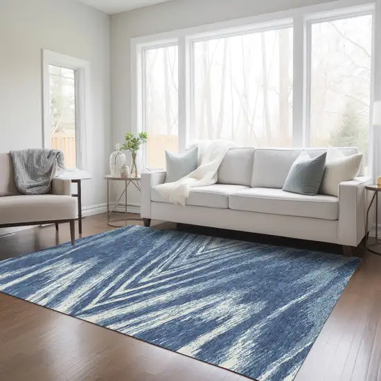 Blue And Ivory Abstract Washable Indoor Outdoor Area Rug Photo 9