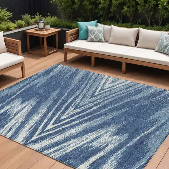 Blue And Ivory Abstract Washable Indoor Outdoor Area Rug Photo 1