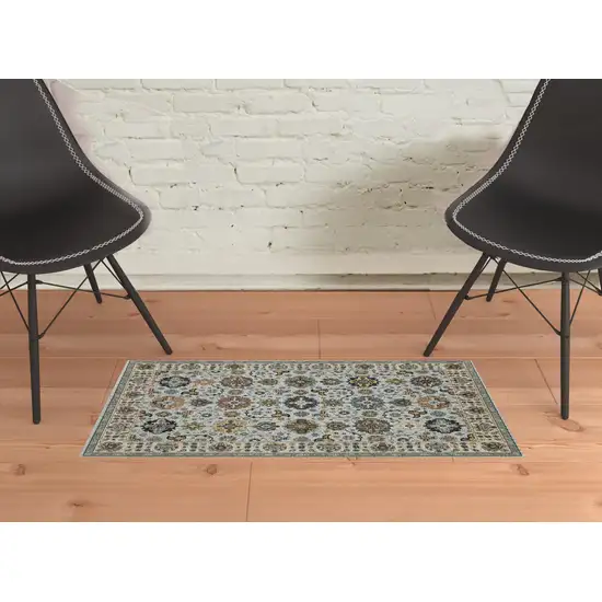 Blue Beige Grey Green Yellow And Rust Oriental Power Loom Stain Resistant Area Rug With Fringe Photo 3